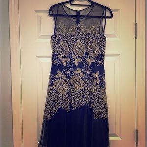 Black dress with gold accents